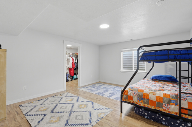 625 East 100 South Ephraim, UT 84627 - Photo 20 of 26 Bright bedroom featuring wood-finish flooring and a window with blinds