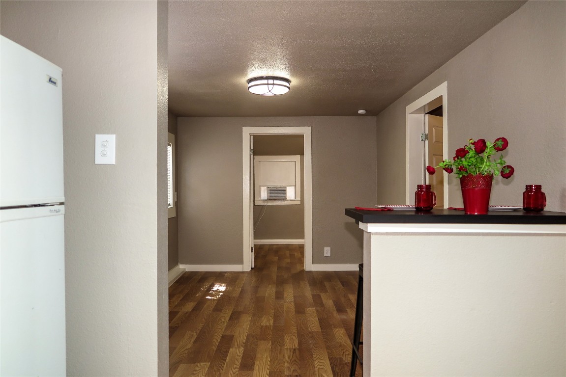 1312 A Pine Street, Unit A Georgetown, TX 78626 - Photo 12 of 26 a view of hallway with wooden floor