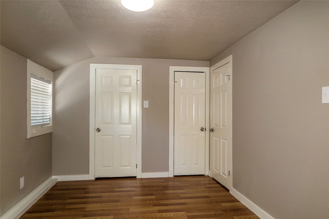 1312 A Pine Street, Unit A Georgetown, TX 78626 - Photo 17 of 26 a view of an empty room with wooden floor and closet