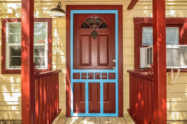 a front view of a house with a front door