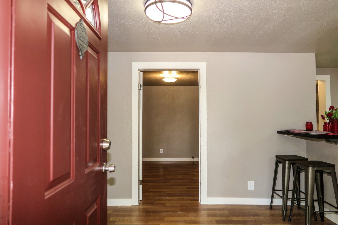 1312 A Pine Street, Unit A Georgetown, TX 78626 - Photo 6 of 26 a view of front door with wooden floor