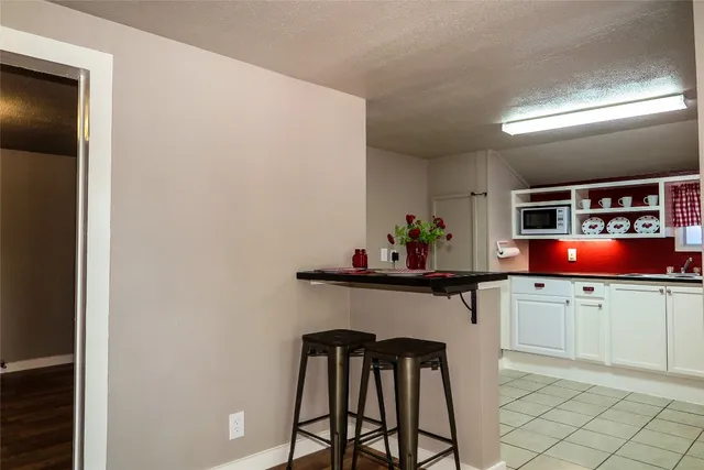 a view of kitchen with breakfast area