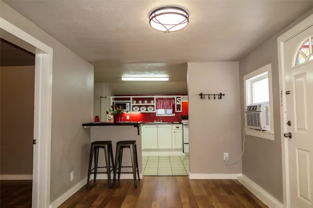 a room with furniture and a window