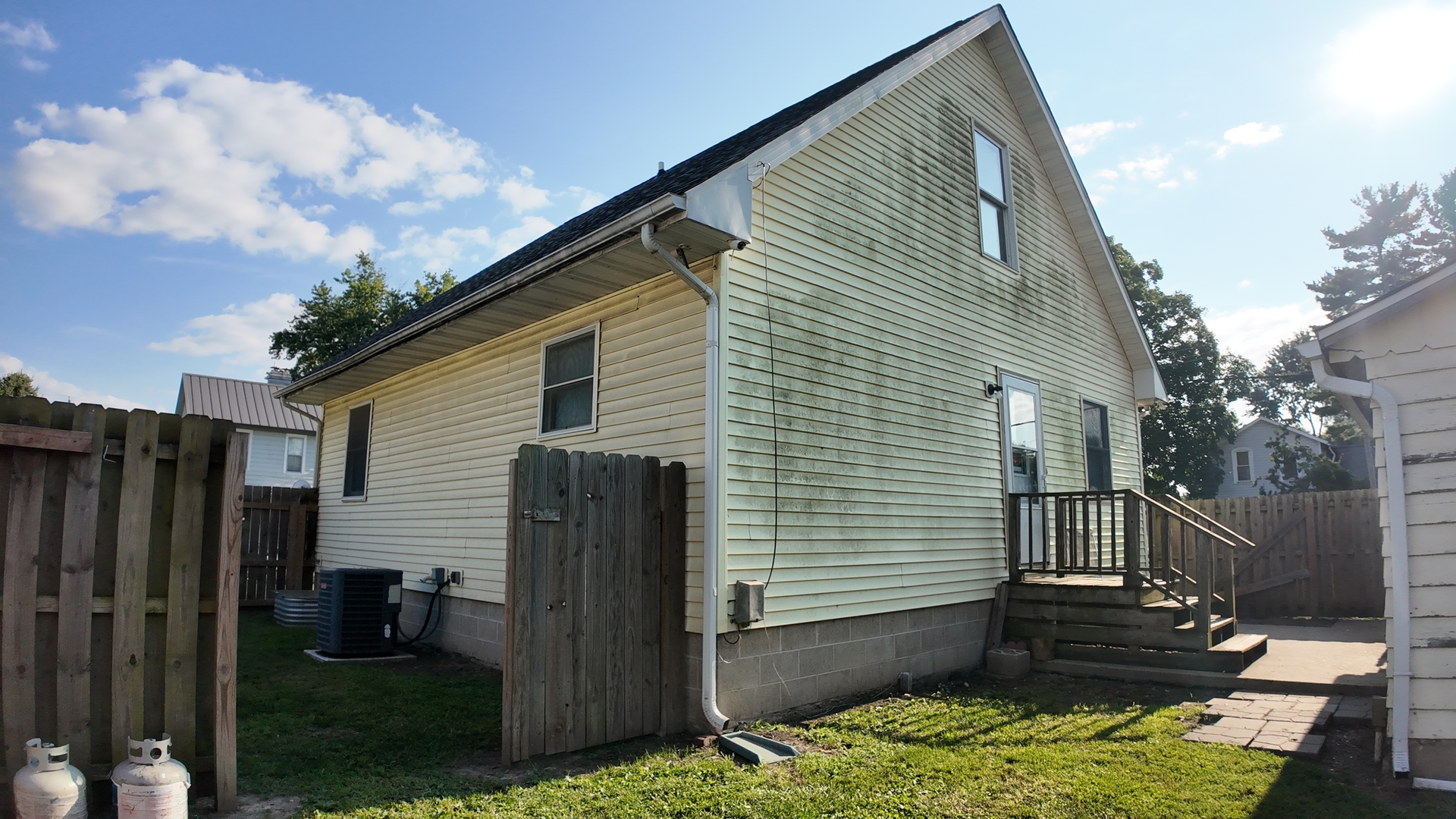 601 East Webster Street Clinton, IL 61727 - Photo 16 of 21 a view of a house with a yard