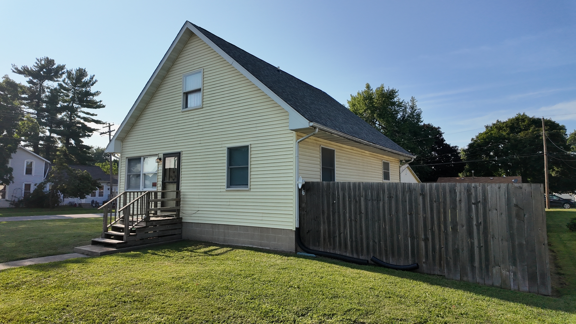 601 East Webster Street Clinton, IL 61727 - Photo 2 of 21 a view of a backyard with a garden and entertaining space