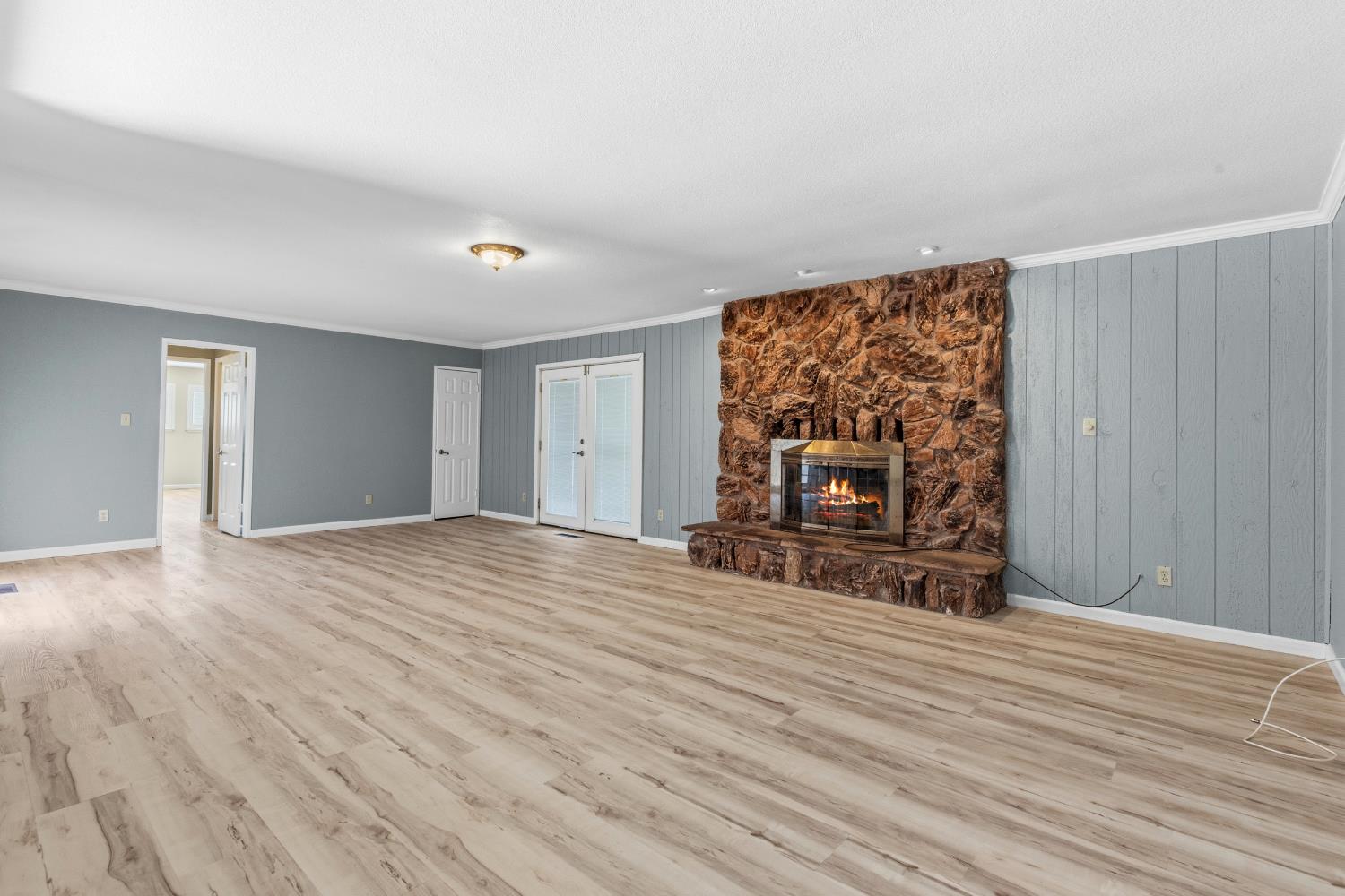 17500 Von Sosten Road Tracy, CA 95304 - Photo 11 of 50 a view of empty room with wooden floor and fan