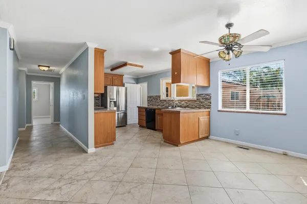 a view of an entryway with kitchen