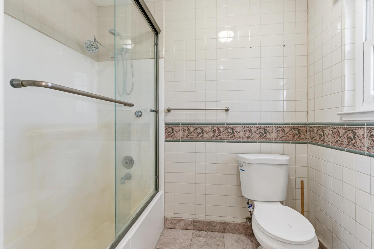 17500 Von Sosten Road Tracy, CA 95304 - Photo 28 of 50 a bathroom with a toilet and a shower