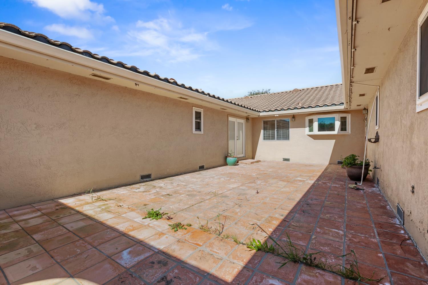 17500 Von Sosten Road Tracy, CA 95304 - Photo 35 of 50 a view of a white house with a outdoor space