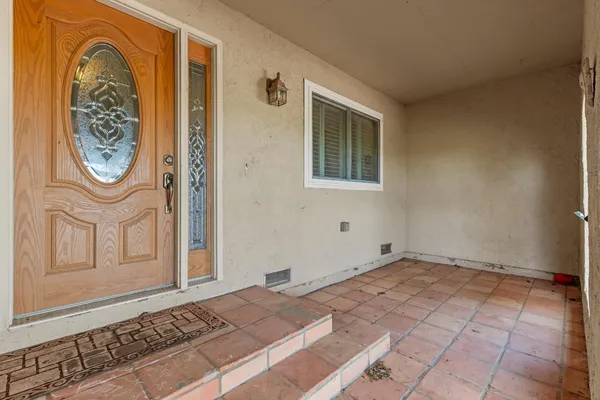 a view of a hallway with entryway
