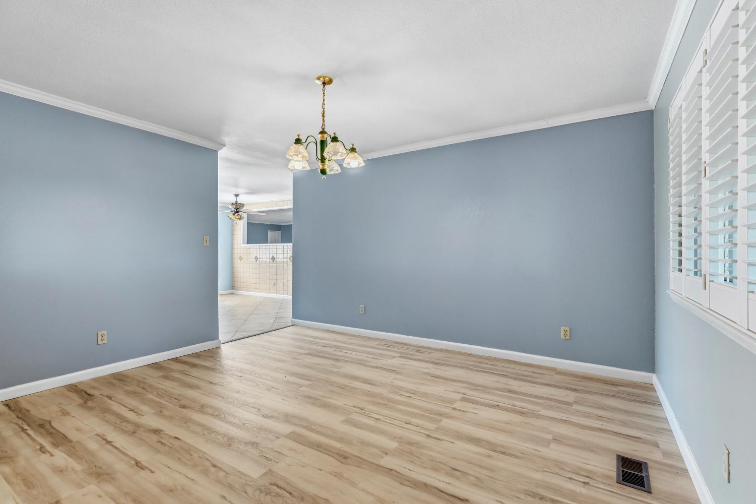 17500 Von Sosten Road Tracy, CA 95304 - Photo 9 of 50 a view of an empty room with window and wooden floor