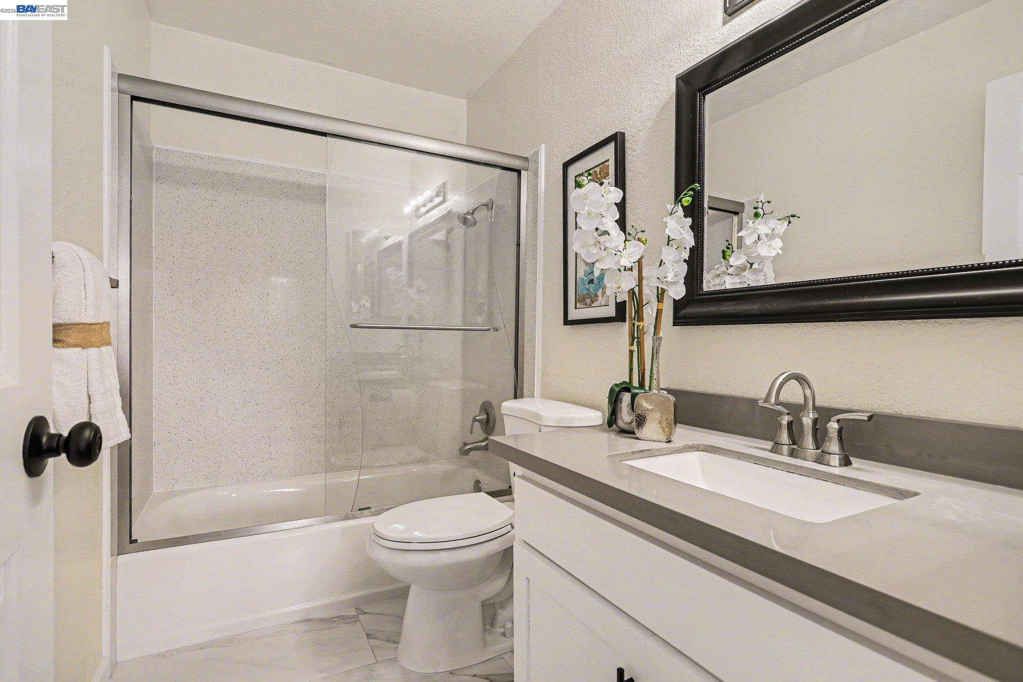 3683 Crow Canyon Road San Ramon, CA 94582 - Photo 12 of 24 a bathroom with a sink a toilet and shower
