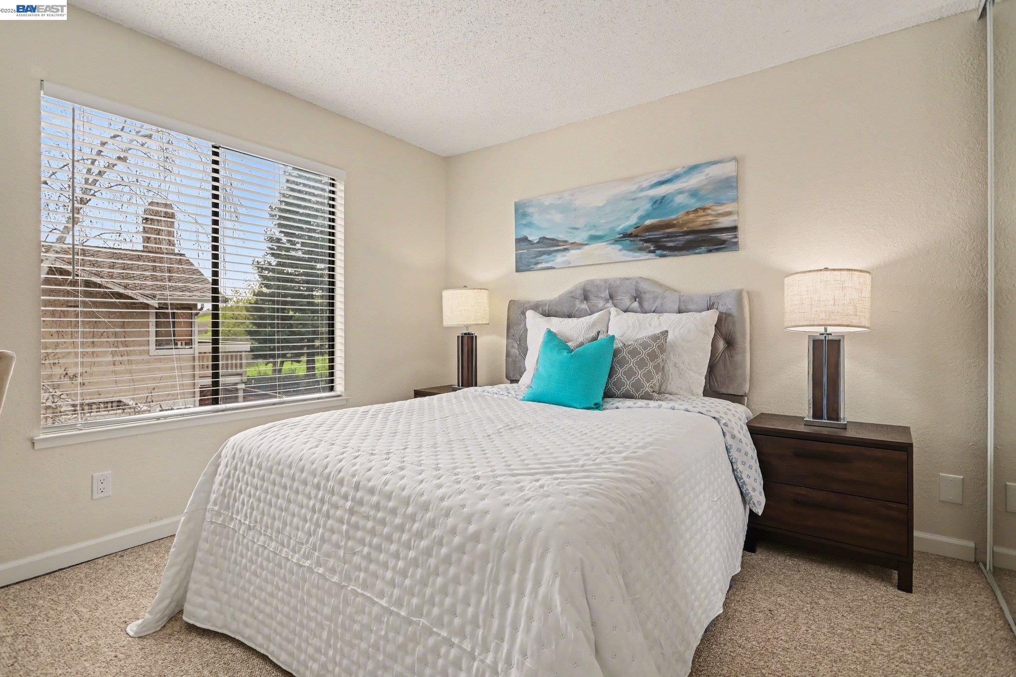 3683 Crow Canyon Road San Ramon, CA 94582 - Photo 14 of 24 a bedroom with a bed and a night stand