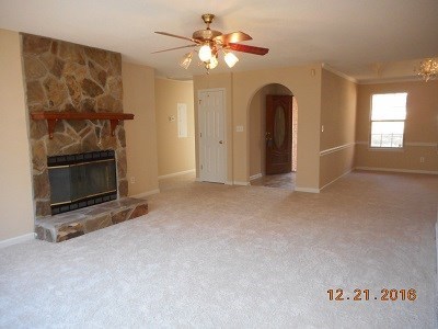 979 Old Cabaniss Road Forsyth, GA 31029 - Photo 18 of 33 a view of a room with a flat screen tv and fireplace