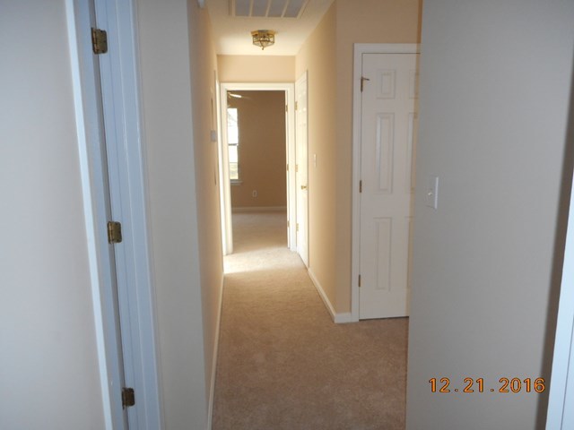 979 Old Cabaniss Road Forsyth, GA 31029 - Photo 19 of 33 a view of a hallway with closet area