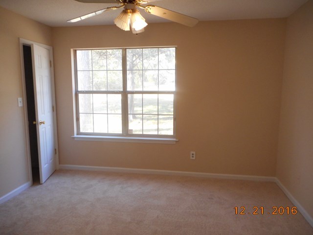 979 Old Cabaniss Road Forsyth, GA 31029 - Photo 20 of 33 an empty room with a window