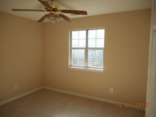 979 Old Cabaniss Road Forsyth, GA 31029 - Photo 21 of 33 an empty room with a window