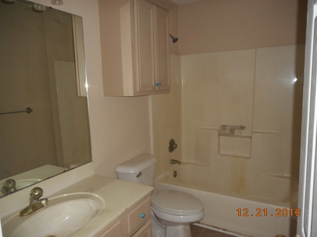 979 Old Cabaniss Road Forsyth, GA 31029 - Photo 22 of 33 a bathroom with a sink toilet and shower