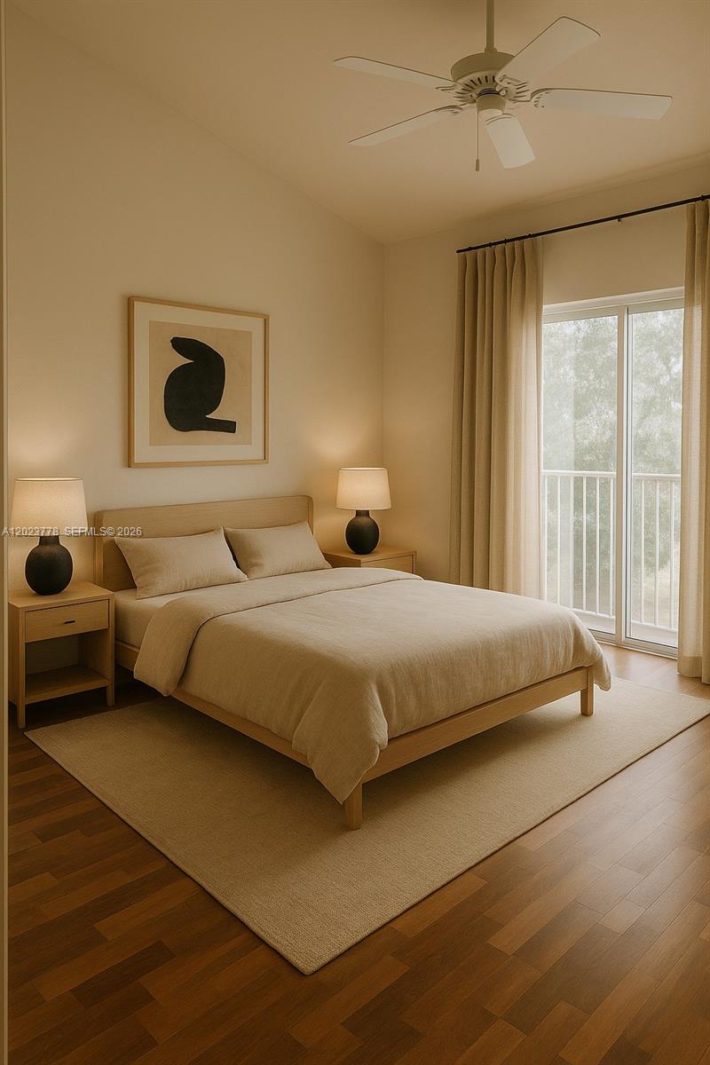 10245 Vía Hibiscus, Unit 10245 Boca Raton, FL 33428 - Photo 2 of 28 a bedroom with a bed and a large window