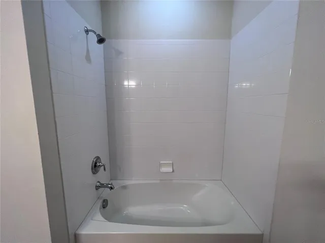 a close up of a bathtub in a bathroom