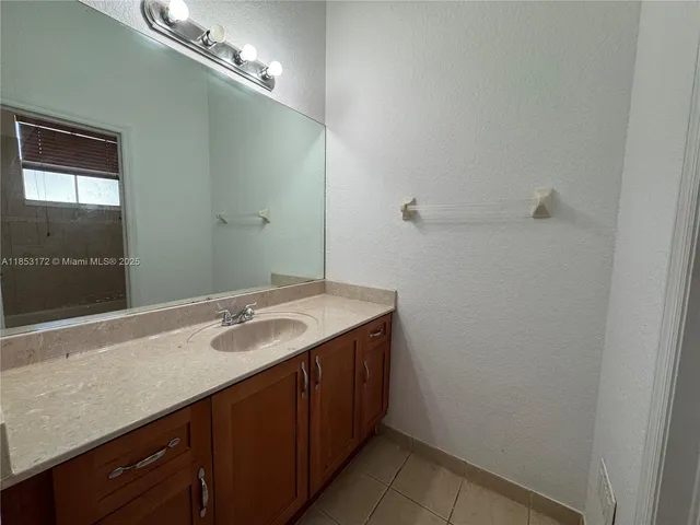 a bathroom with a toilet and bathtub