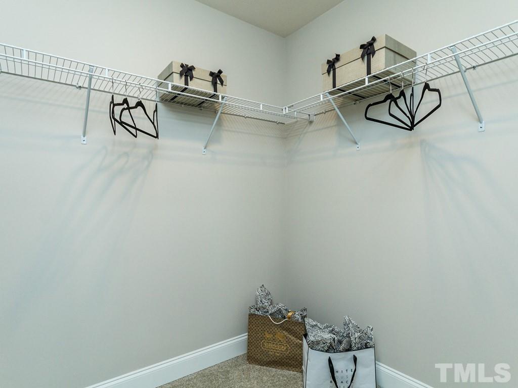 204 Kentigern Drive, Unit 34 Raleigh, NC 27606 - Photo 11 of 33 a view of a room with gym equipment