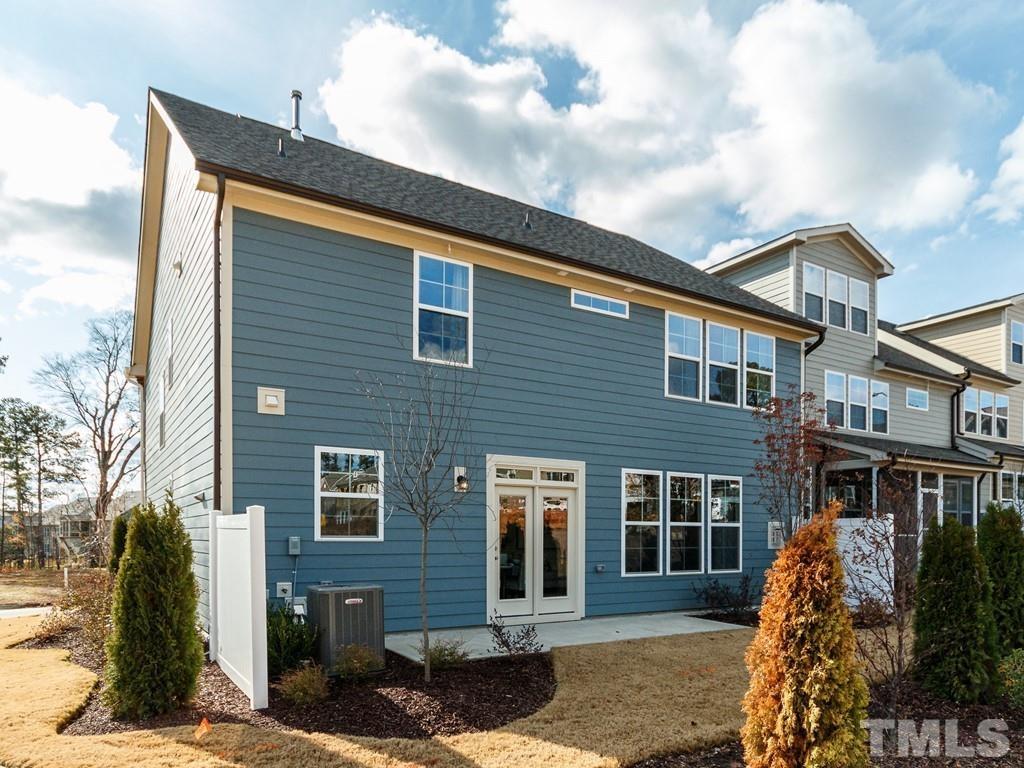 204 Kentigern Drive, Unit 34 Raleigh, NC 27606 - Photo 15 of 33 a front view of a house with a yard