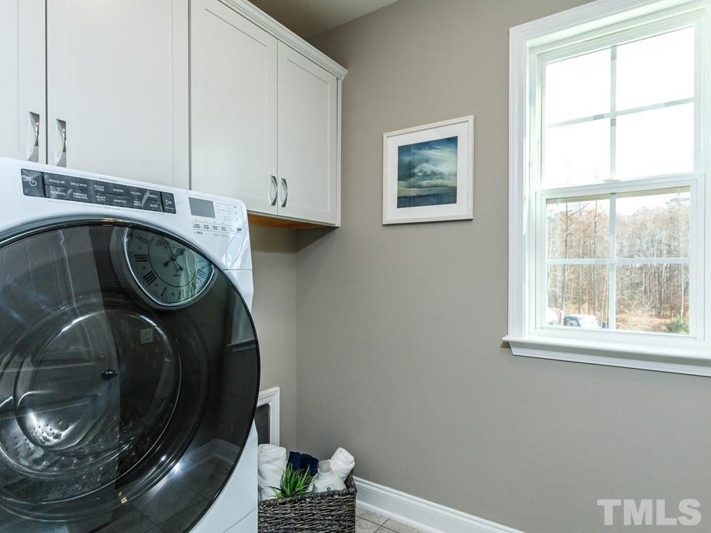 204 Kentigern Drive, Unit 34 Raleigh, NC 27606 - Photo 4 of 33 a close view of washer and dryer