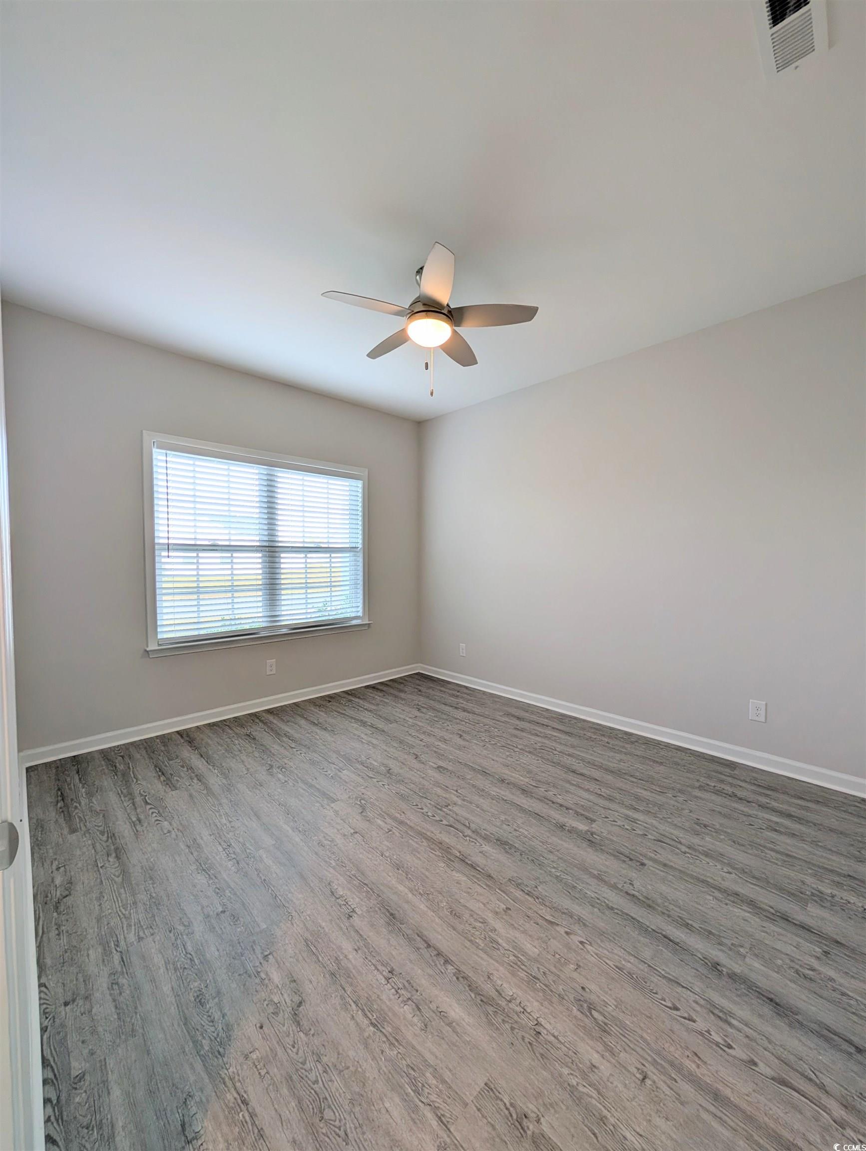 351 Lakota Loop Longs, SC 29568 - Photo 16 of 31 Empty room featuring light wood-style floors and ceiling fan