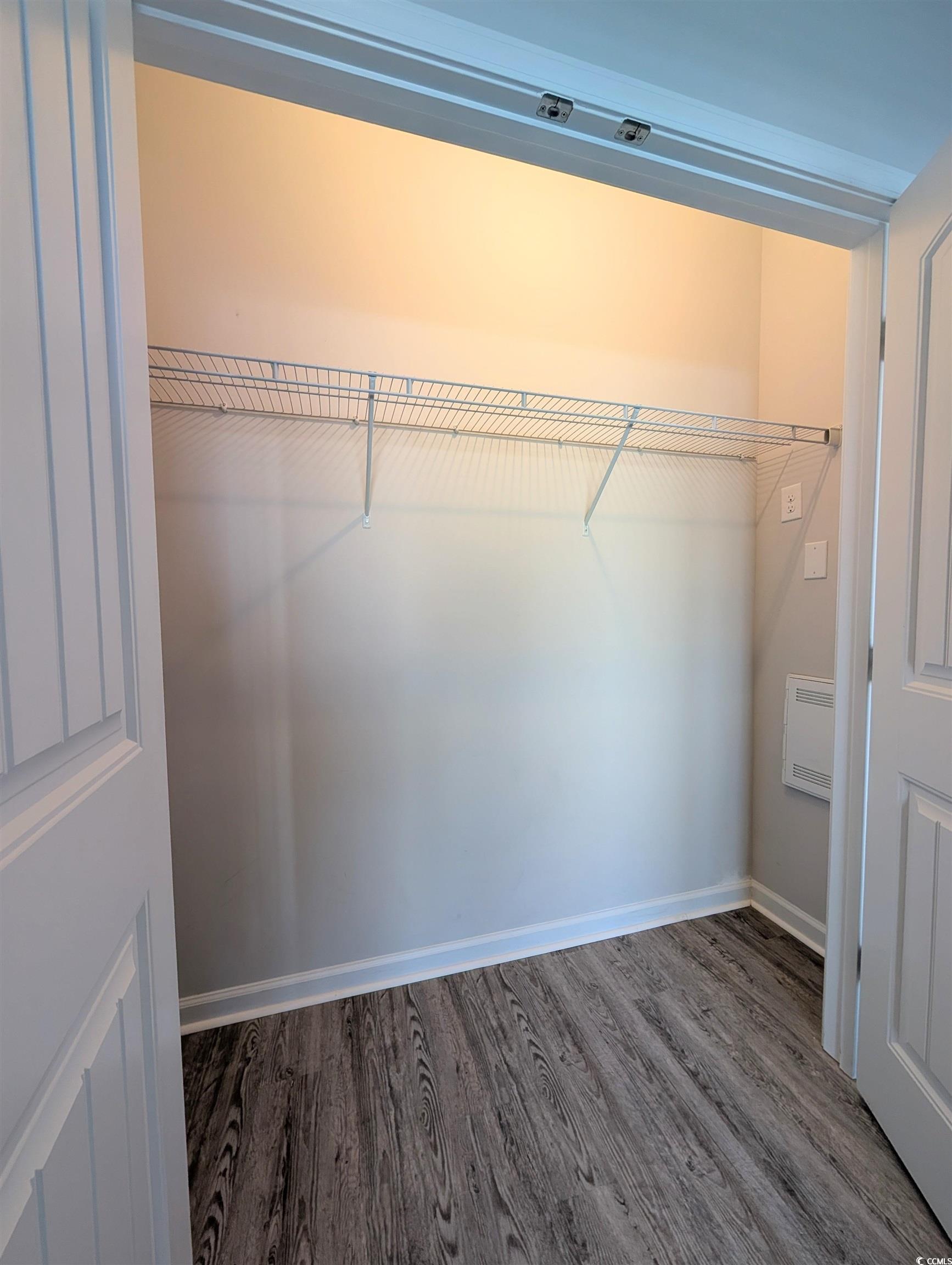 351 Lakota Loop Longs, SC 29568 - Photo 18 of 31 Laundry area featuring dark wood-style floors and heating unit