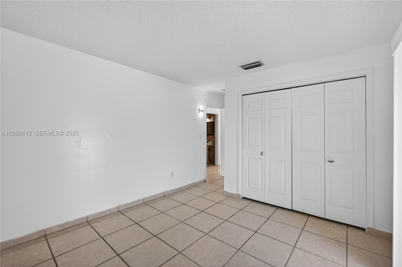 13471 Southwest 99th Terrace Miami, FL 33186 - Photo 33 of 44 a view of an empty room