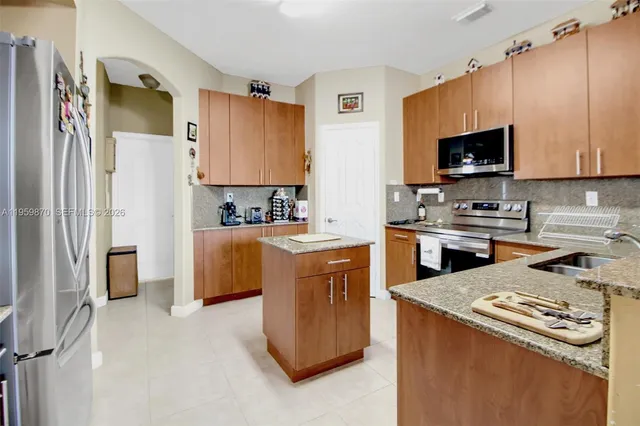 $699,999 | 11531 Northwest 79th Lane, Doral, FL 33178