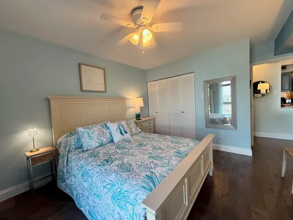 a view of dresser and wooden floor