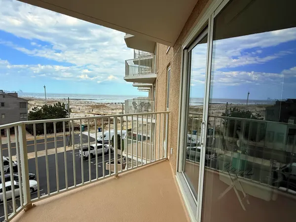 a view of a balcony with city view