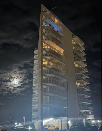 a front view of a building with street view