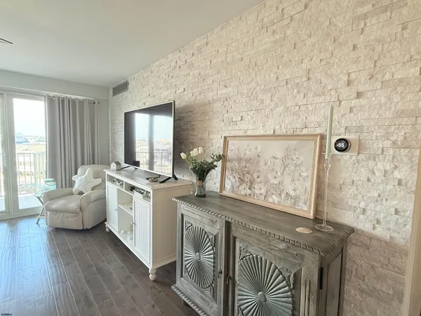 a view of living room with furniture and window