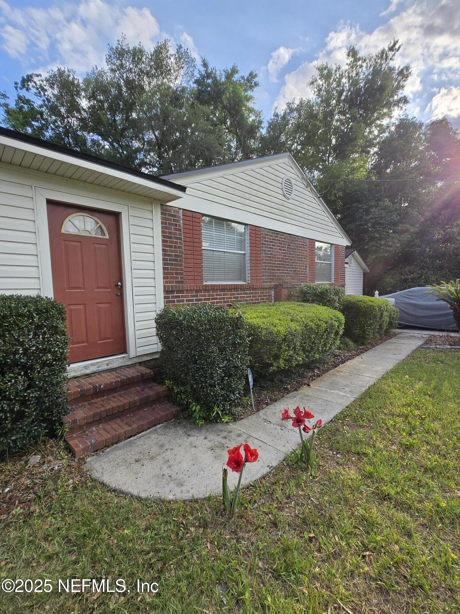 3224 Claremont Road Jacksonville, FL 32207 - Photo 1 of 26 a view of a house with a yard