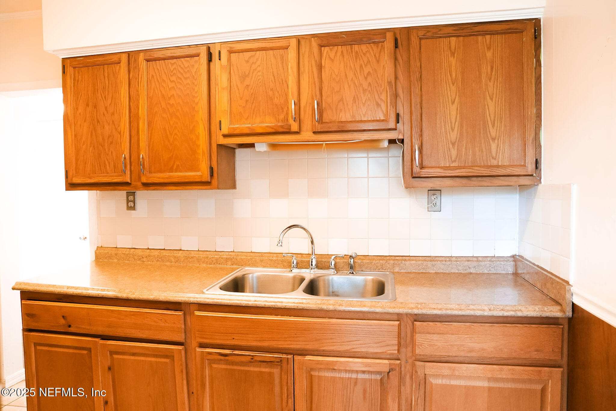 3224 Claremont Road Jacksonville, FL 32207 - Photo 17 of 26 a kitchen with a sink and cabinets