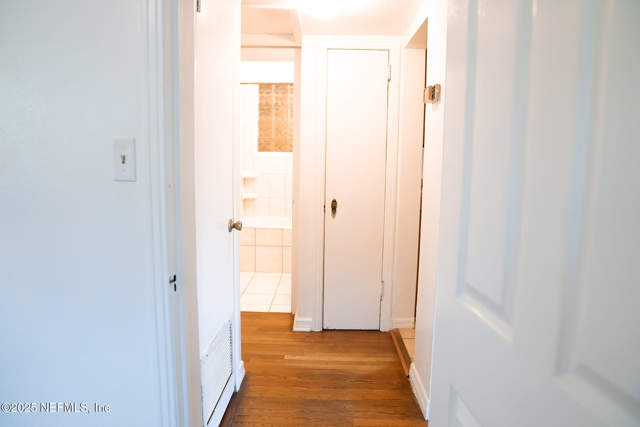 3224 Claremont Road Jacksonville, FL 32207 - Photo 9 of 26 a view of a bathroom from a hallway