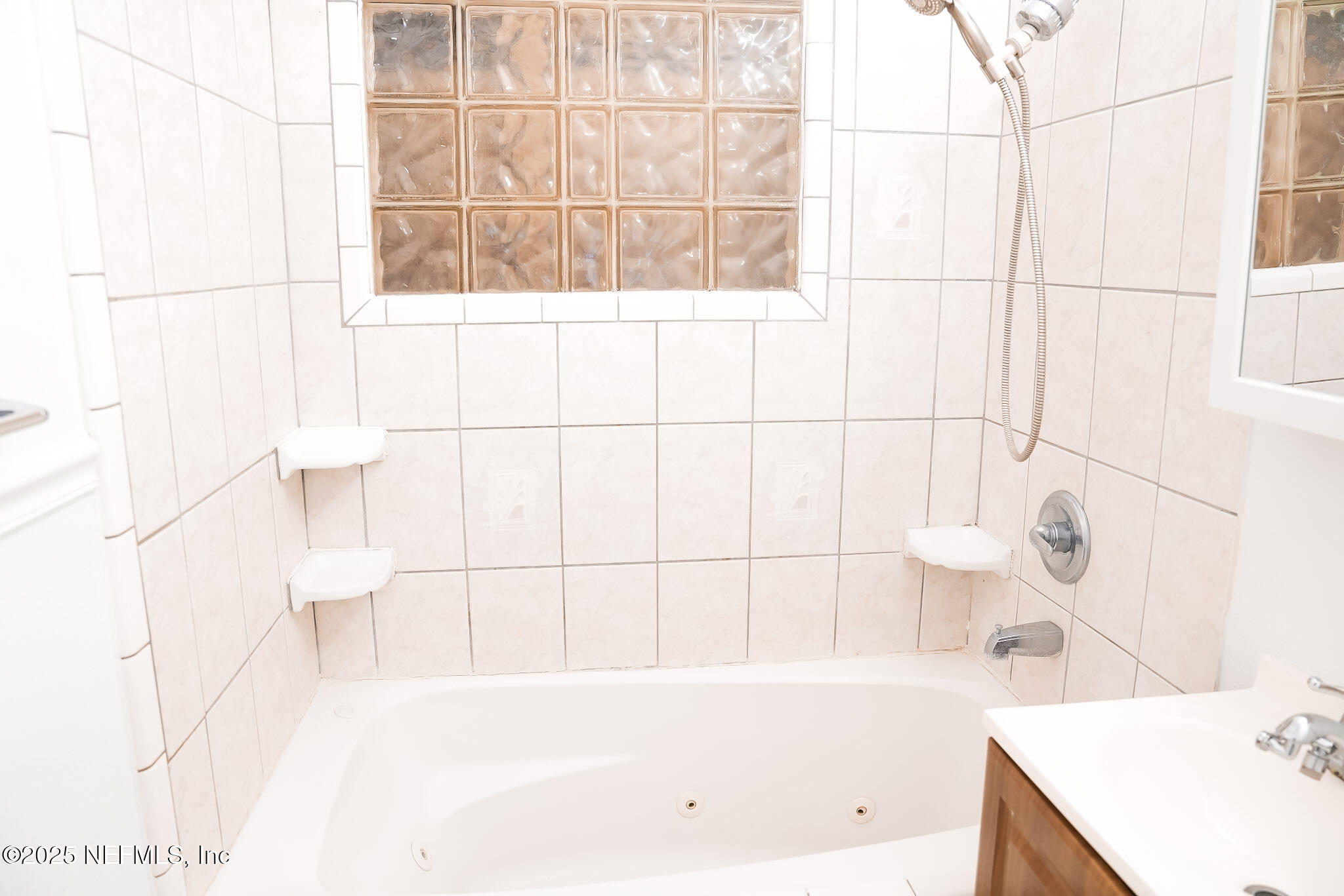 3224 Claremont Road Jacksonville, FL 32207 - Photo 10 of 26 a bathroom with a bathtub and a sink