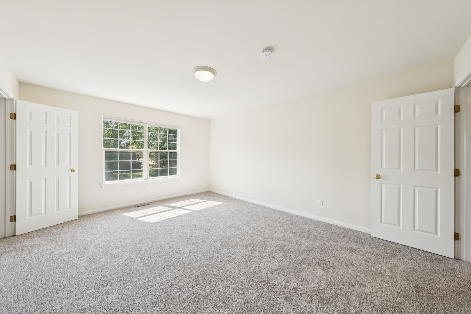 11683 Joan Avenue Huntley, IL 60142 - Photo 11 of 21 an empty room with windows