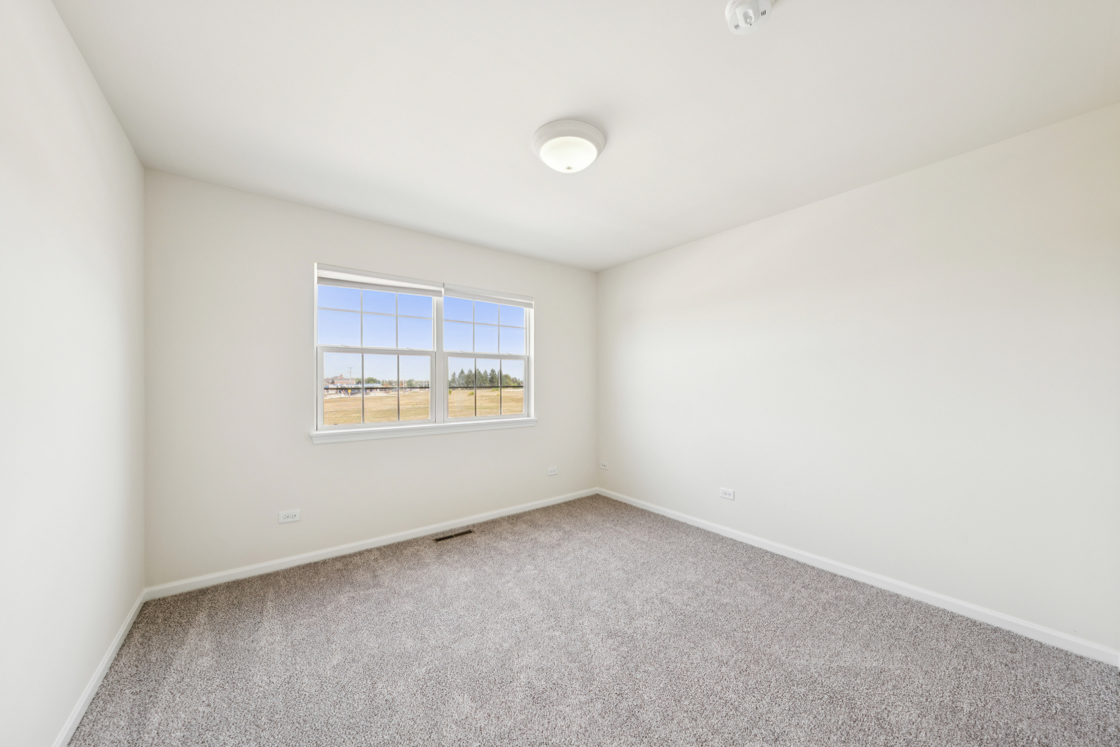 11683 Joan Avenue Huntley, IL 60142 - Photo 15 of 21 an empty room with a window