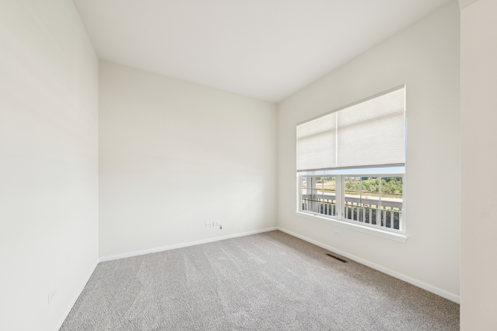 11683 Joan Avenue Huntley, IL 60142 - Photo 3 of 21 an empty room with a window