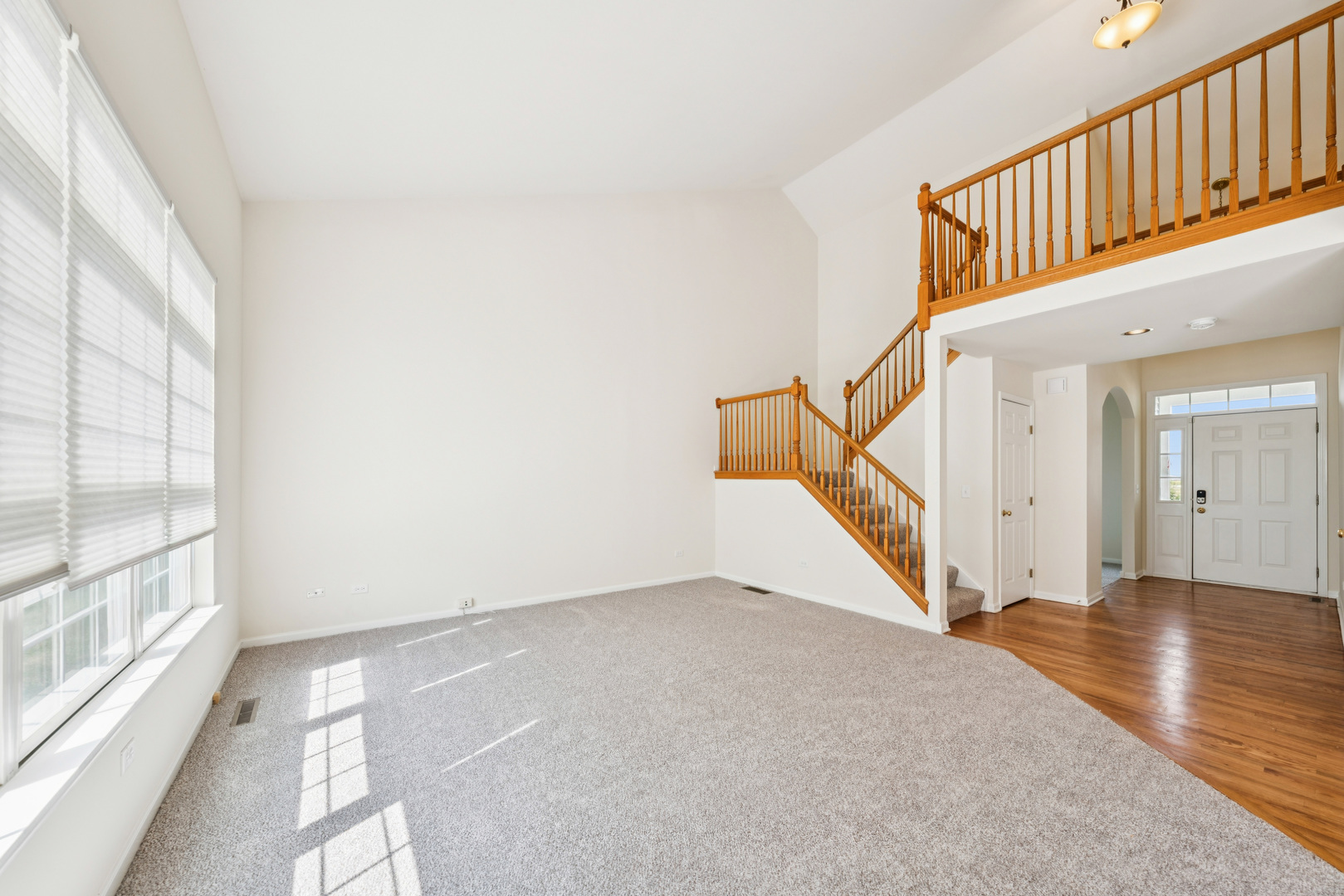 11683 Joan Avenue Huntley, IL 60142 - Photo 4 of 21 a view of an entryway with wooden floor