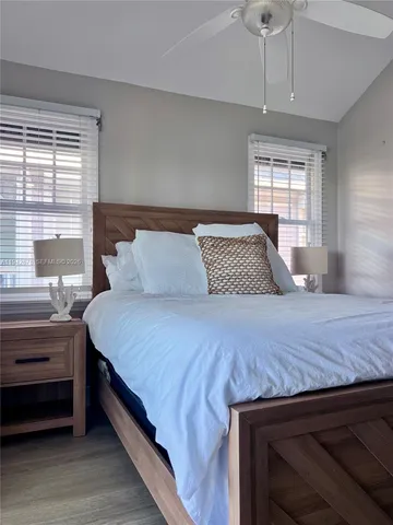 a view of a dining room with furniture and window