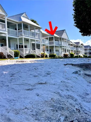 aerial view of a house with a garden