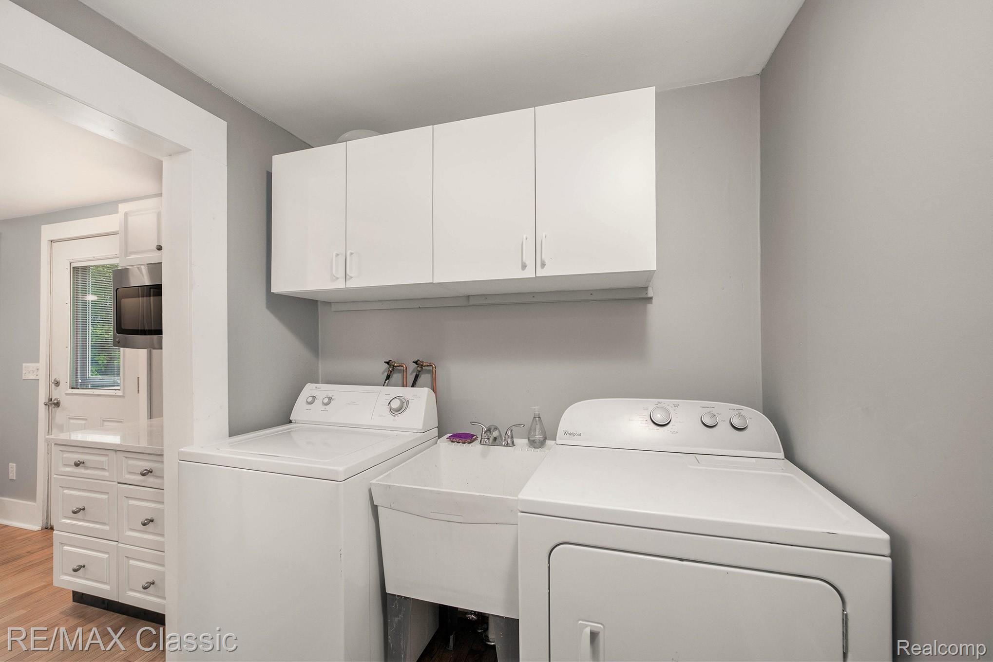 1820 Union Lake Road Commerce Township, MI 48382 - Photo 20 of 47 Main floor laundry room is very spacious