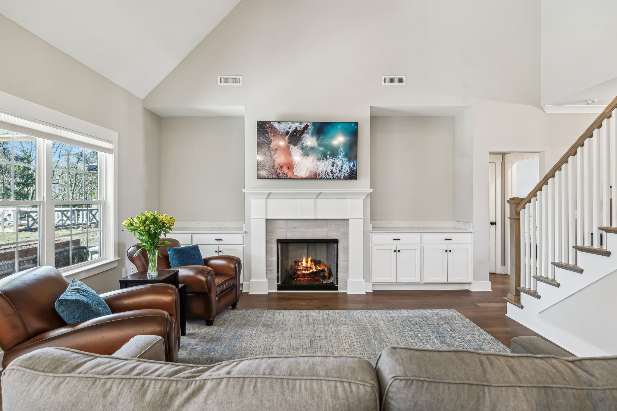 1567 Harrison Road Murfreesboro, TN 37128 - Photo 14 of 56 a living room with furniture and a fireplace