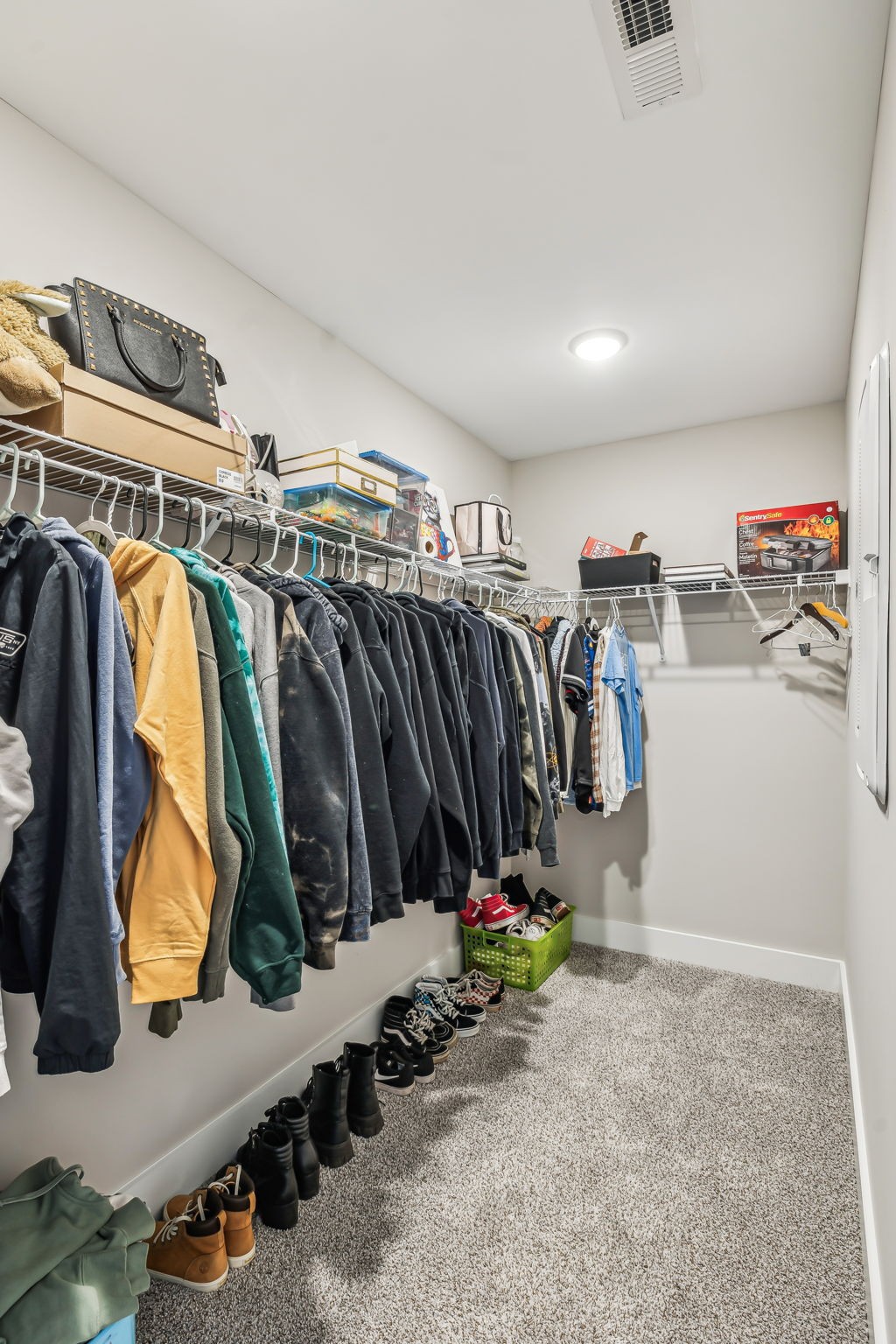 1567 Harrison Road Murfreesboro, TN 37128 - Photo 35 of 56 a view of walk in closet with clothes and shoes