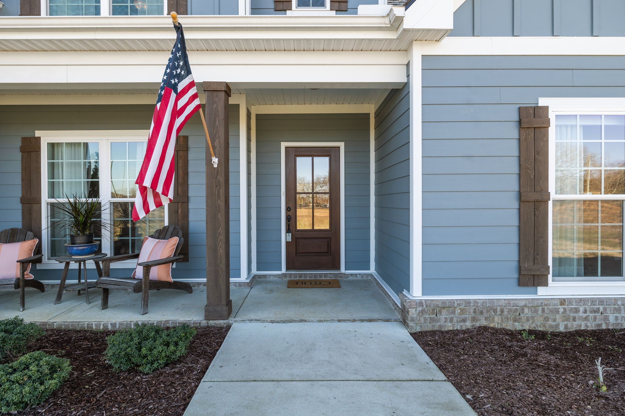 1567 Harrison Road Murfreesboro, TN 37128 - Photo 7 of 56 a front view of a house with outdoor seating